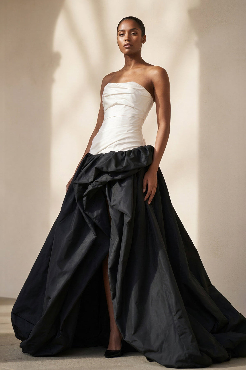 Pleated Strapless Gown With Slit in Black and Ivory - SHE IS ME Prom Dresses